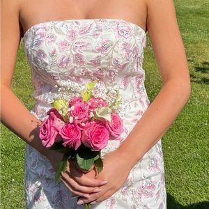 Beautiful white prom gown with embroidered pink flowers